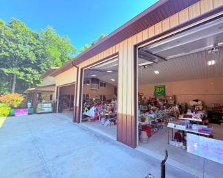 The five stall pole barn with a work shop and upper level. 