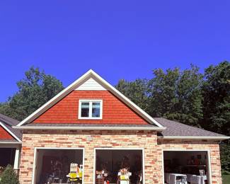 The three stall attached garage, house and basement are all full of treasures! Check-out is on the far right. 