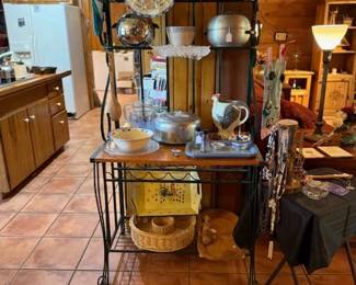 Wooden and green metal shelf with lots of kitchen items some vintage and Jewelry