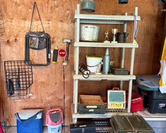 Lanterns, coolers and wooden boxes