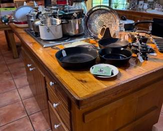 Lots of kitchen items, cast iron skillets, pots and pans and so much more