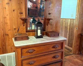Very Ornate dresser with mirror and marble top not very wide but very tall