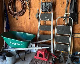 Step ladders, wheelbarrow and many tools