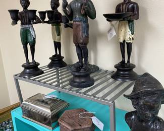 Collection of rare antique bronze Nubian Blackamoor candle holders. 