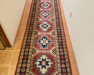 Hand knotted in Pakistan