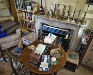 Large amount of antique candle stick holders 