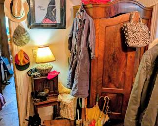 Hats, umbrellas, an armoire, roller skates, a vintage wooden radio that works...