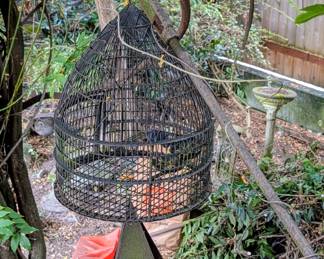 A large and fabulous wrought iron bird cage