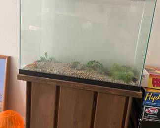 Large fish aquarium on storage stand 