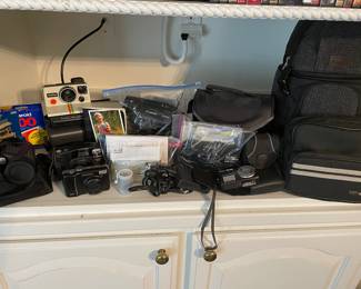 So many cameras and equipment!!