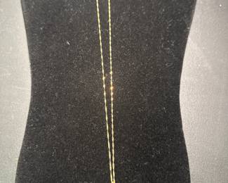 necklace with the letter "E"