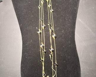 Long gold necklace