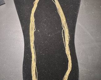 Long gold necklace