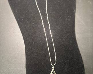 Necklace with the letter "E"