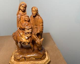 olive wood statue depicting the Holy Family's Flight into Egypt