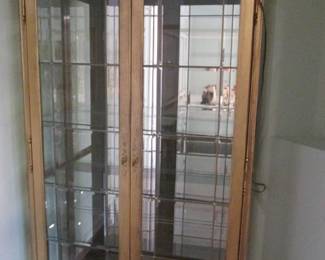 Tall Display Cabinet, Gold-Gilded Frame over Mahogany Wood, Lighted, Mirrored, 4-Glass Shelves, 10 Beveled Door Panels with Brass Mullions, 48" X 17" X 78" High.
