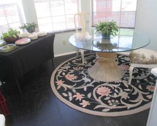 54" Glass-Top Table By McGuire Furniture, San Francisco, "Sheaf Design" Rattan Pedestal Base.                                                     2-Upholstered Side Chairs, Sold Separately.                                   84" Round Rug By Safavieh
