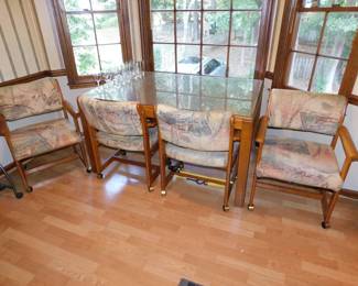 VINTAGE DINING TABLE WITH 4 ROLLING CHAIRS
