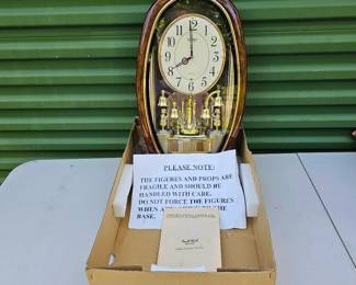 RHYTHM Small World Rhythm Magic Motion Clock