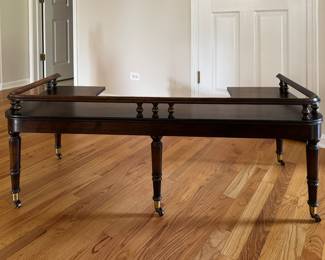 Mike Bell, Inc. Mahogany Hot Toddy Coffee Table on Casters. Measures 52" W x 20" D x 19"  H. Photo 1 of 3. 