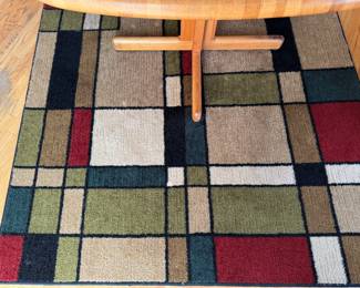 Multi-Color Mosaic Rug. Measures 5' x 7'. 