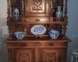Vintage French ornate cupboard sideboard with drawers shelving and decorative detail.
