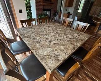 Stone top and wood bar height table set view 
