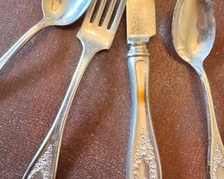 Elegant 1847 Rogers Bros. silverplate flatware, mid-century floral design