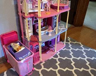 Barbie doll house with Barbies