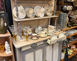 dishwater, wooden hutch, silver pitcher