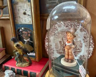 bird figurine, old clock, small decorative elements
