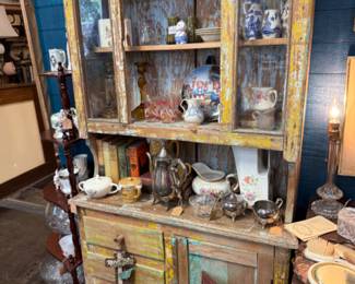 rustic hutch, pitchers, figurines