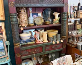 books, glassware, chair, bowls, planters
