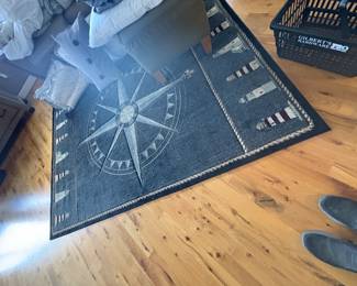 . . . area rug with lighthouse theme