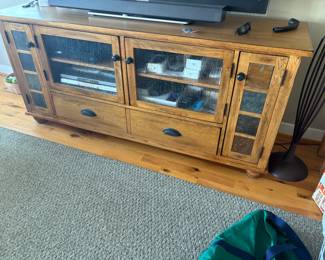 . . . nice oak-toned TV stand