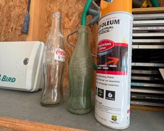 . . . two vintage Coke bottles