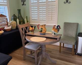 Small table. One leaf and two chairs