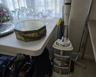 Shark vacuum, Dirt Devil, glassware
