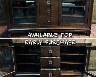 Beautiful, solid, high quality media console/tv stand in excellent condition. 2 glass front side cabinets and 3 middle drawers. Top drawer has the option to flip down, as seen in photos. Very high quality. Drawers roll smooth and constructed with very durable materials.  
$175 
Willing to help load or driveway delivery is available for an additional fee. 

Call or text Pete Langenhan with Clutter Clearers Estate Sales at 507-458-2542 if interested in additional pictures, information or potentially purchasing this item. 