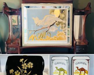 Vintage Mid-Century Turner mirrored print featuring a cockatoo, vintage velvet hand bag, and a pair of vintage Camel Turkish & Domestic Blend cigarette storage tins. 