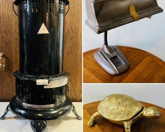 Vintage Perfection kerosene heater, vintage Art Deco style metal desk lamp, and a vintage brass turtle trinket box. 
