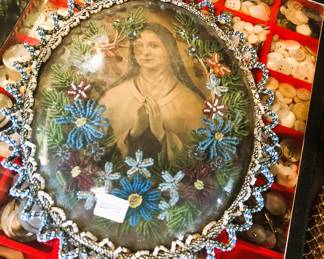 Wonderful beaded frame with bubble glass
