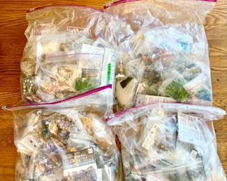 Four 2.5 gallon bags of beads and findings, sold by the bag.