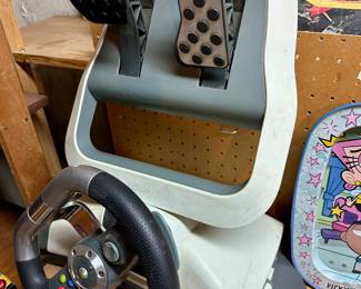 Xbox 360 steering wheel and foot pedal.