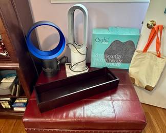 Large storage ottoman and two Dyson fans.