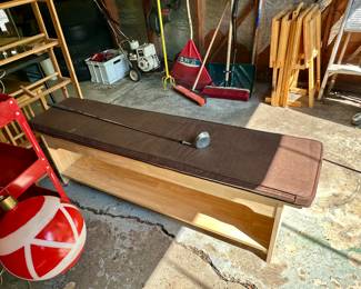 Nice wood bench with cushion.