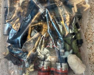 Bag full of Action figures.