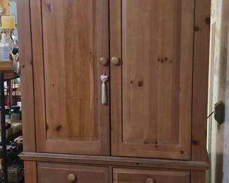 Part of a 4 piece king size bedroom set - priced separately,  Armoire with lots of storage in it.by Broyhill