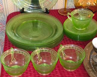 Popular Vaseline or Uranium Glass. Glows under blacklight