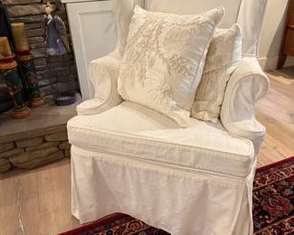 White slip covered wing chair
